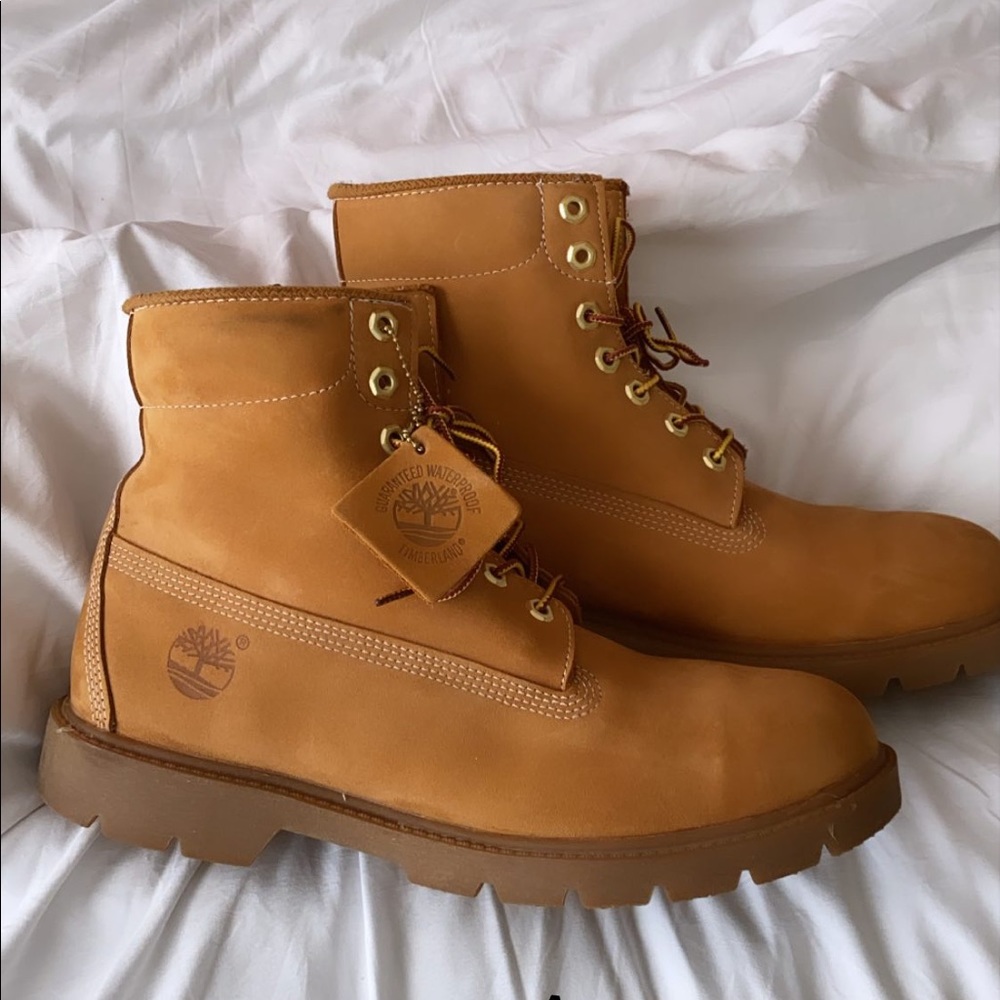 Suede Timberland boots with gum bottoms